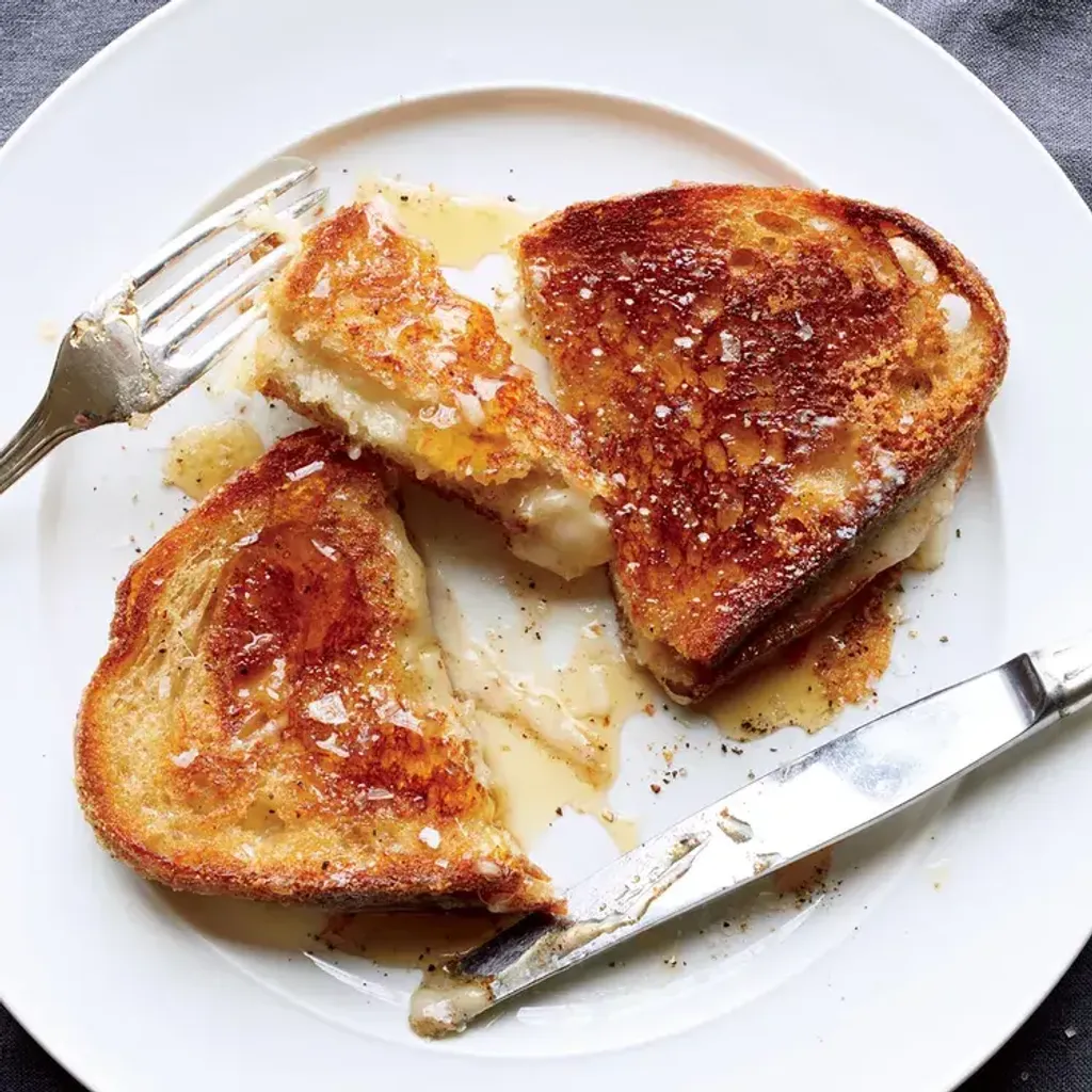 knife-and-fork-grilled-cheese-with-honey-XL-RECIPE0517_0-6df432123ea748ee8466e2c4c3f43897