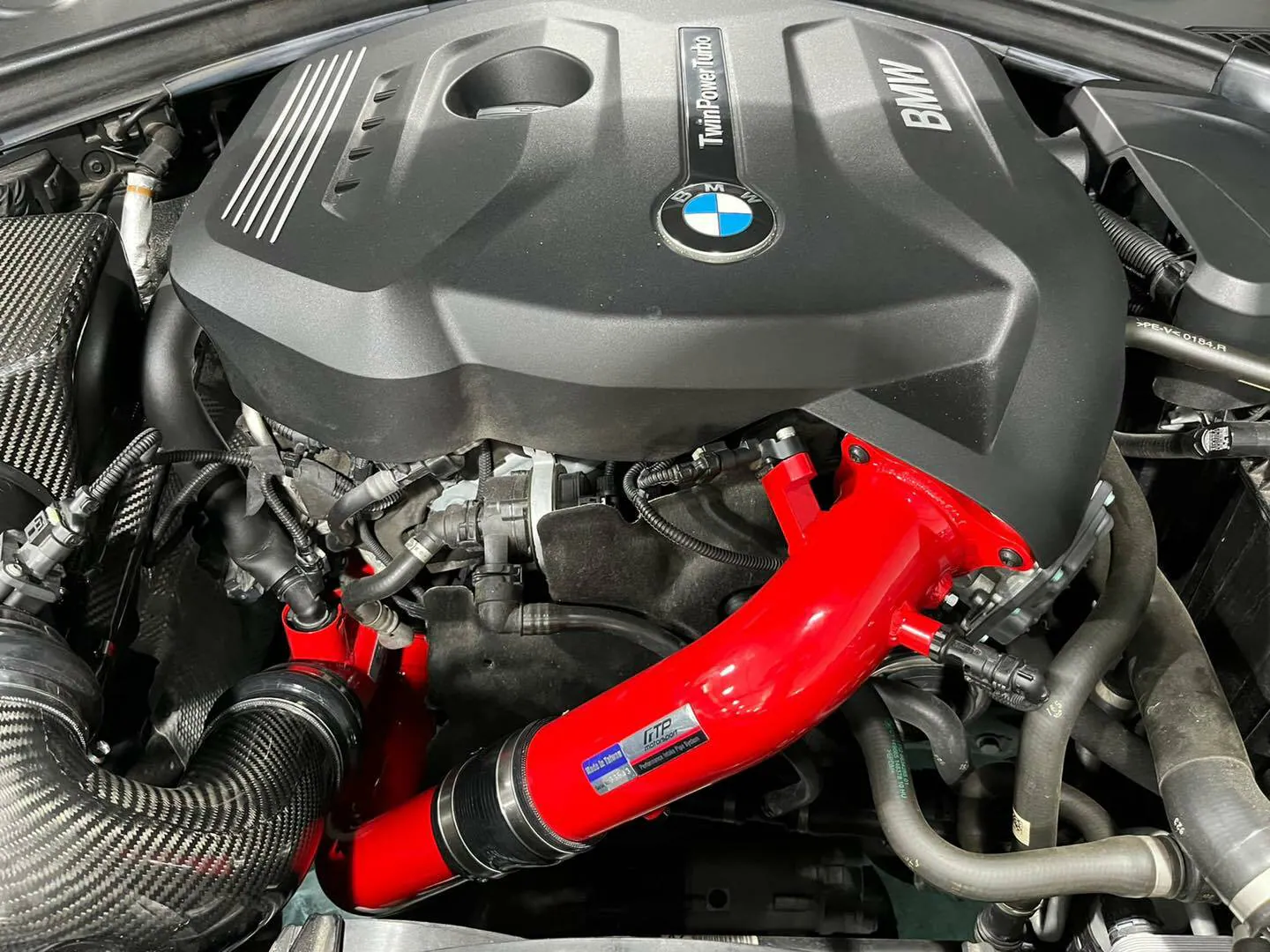 FTP B48/B46 charge pipe V2 — throttle body flange close-up