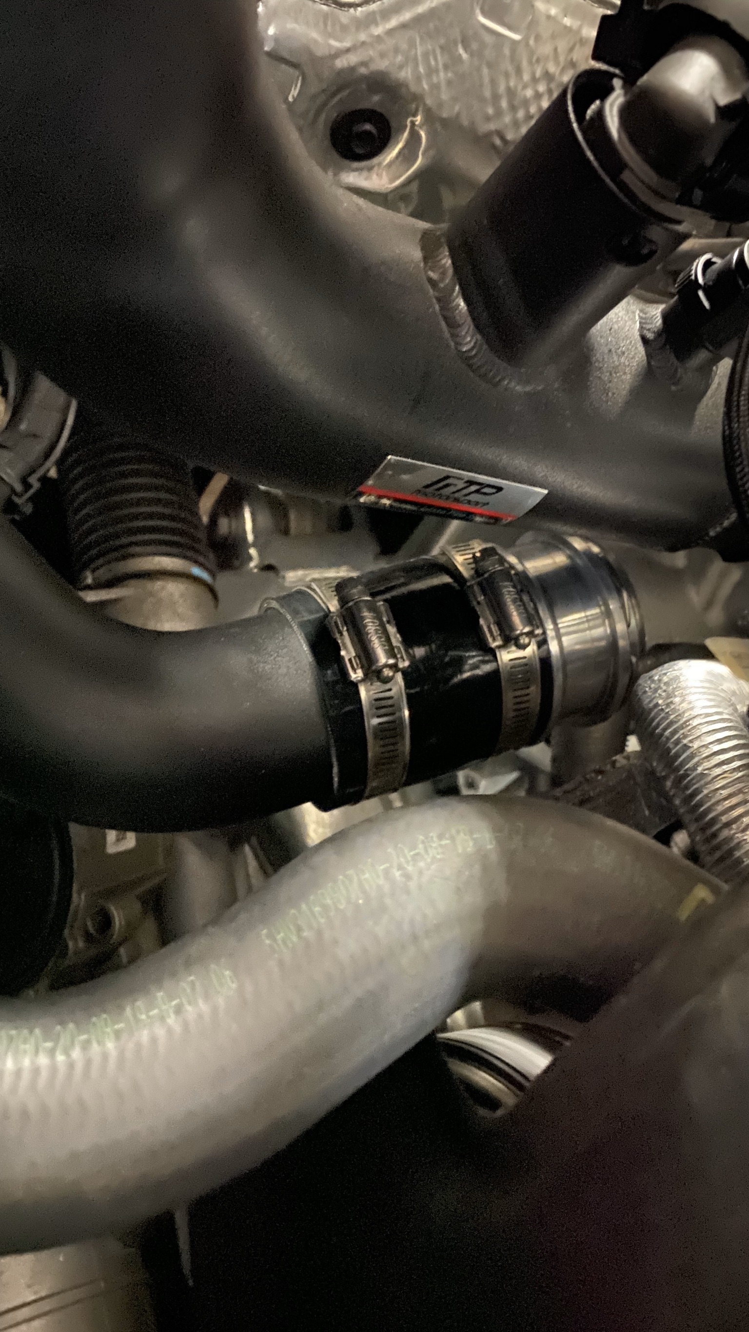 Installed FTP B48 aluminum charge pipe inside BMW G20 engine bay