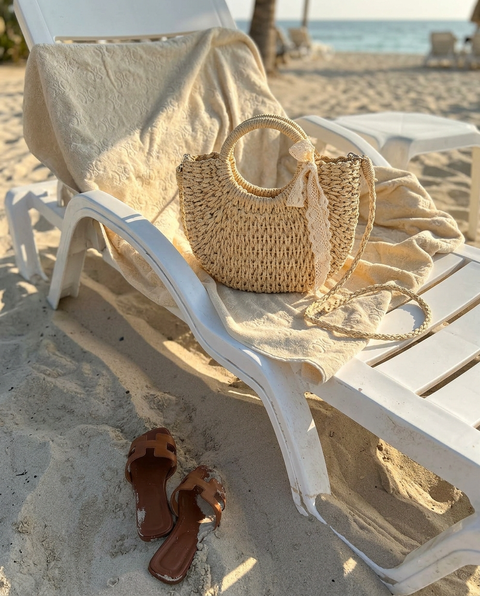 Place_the_light_beige_woven_basket_bag_with_lace_r-1780359903101