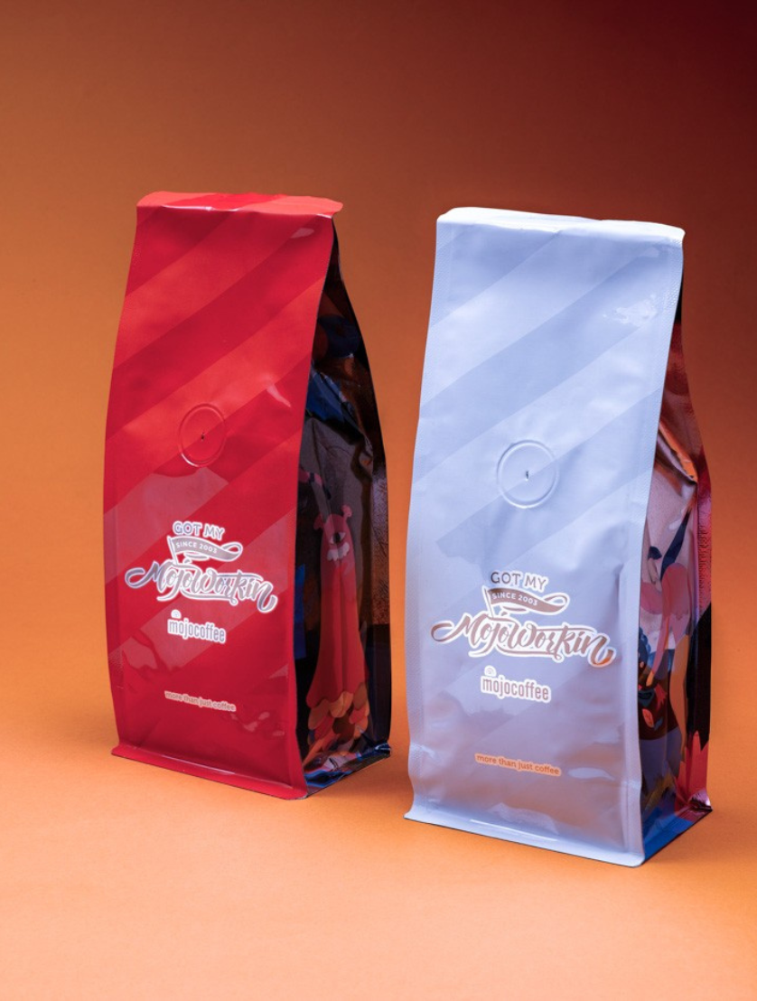 mojocoffee coffee packaging detail, spot varnish Got My Mojo Workin' slogan close-up