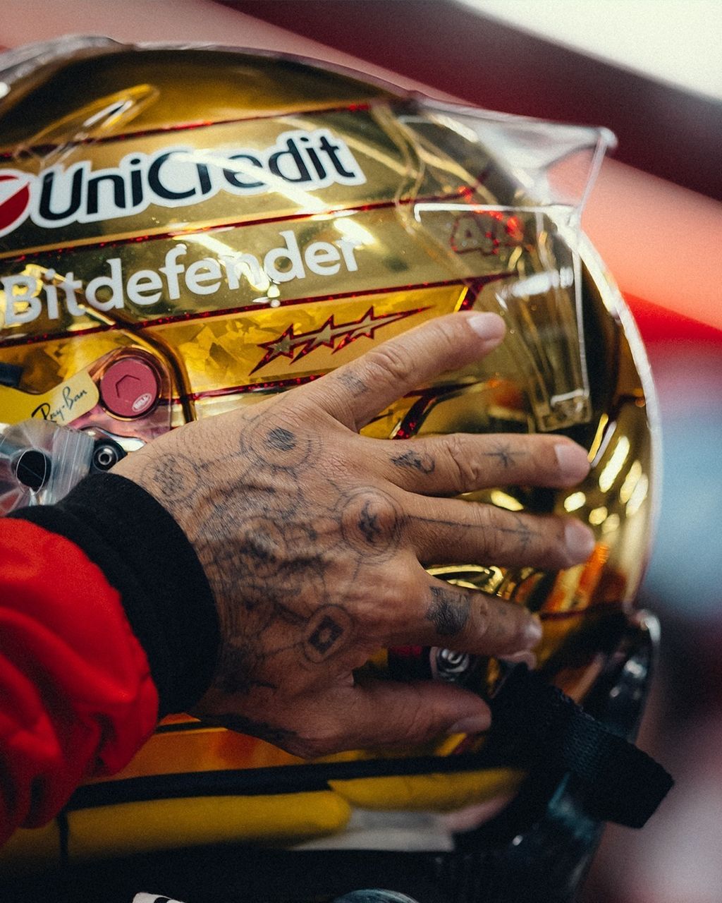 hamilton-singapore-2026-gold-chrome-helmet-closeup
