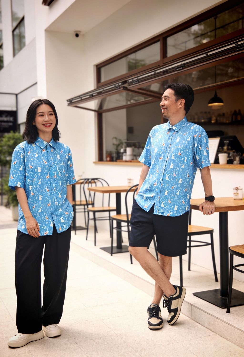 freepik__chic-couple-full-body-on-a-bright-minimalist-cafe-__71120