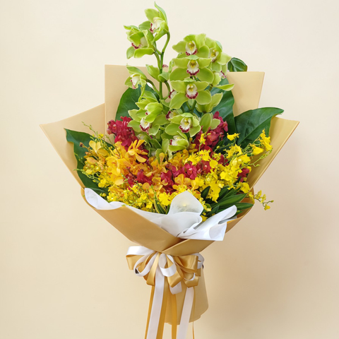 Precious Bloom cymbidium orchids and mokara orchids hand bouquet for birthday or anniversary with delivery in Kuala Lumpur and Selangor