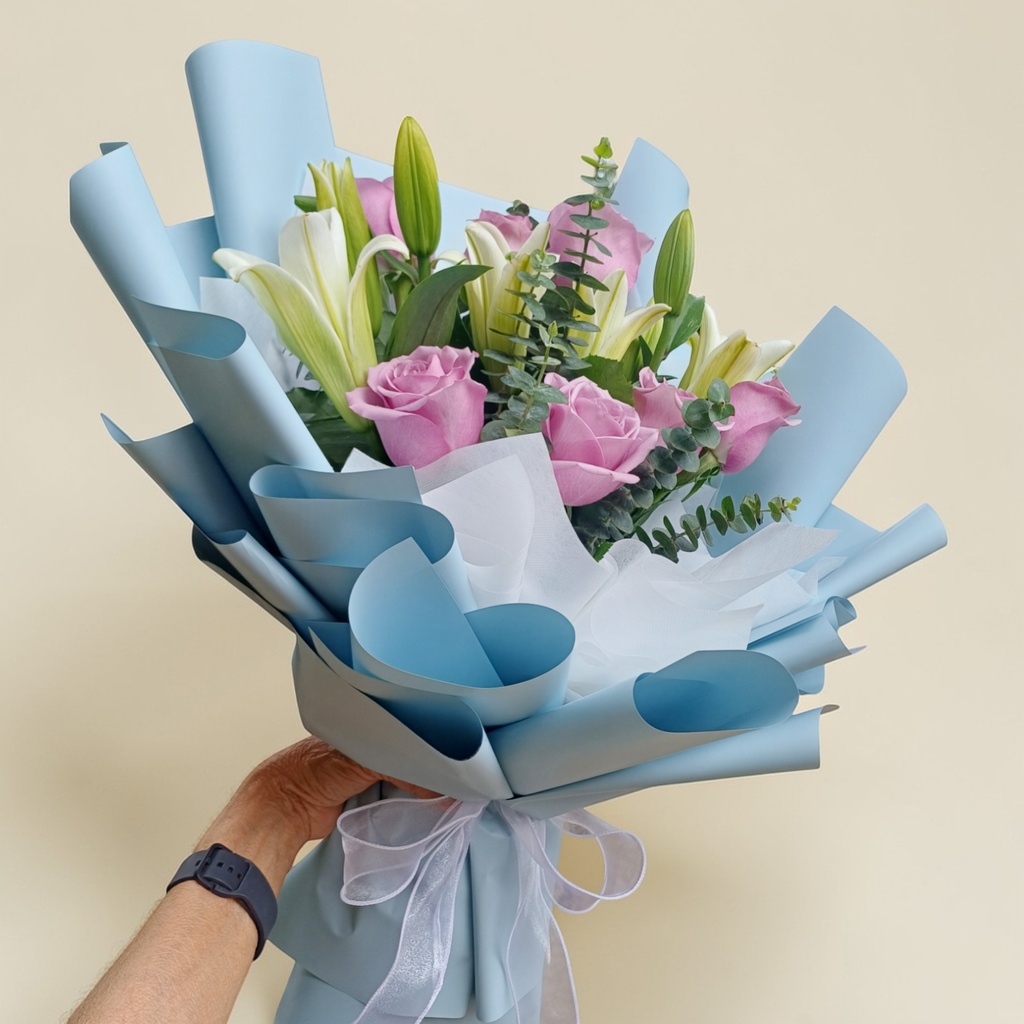 Soft Serenade lilies, rose and eucalyptus hand bouquet for birthday or anniversary with delivery in Kuala Lumpur and Selangor