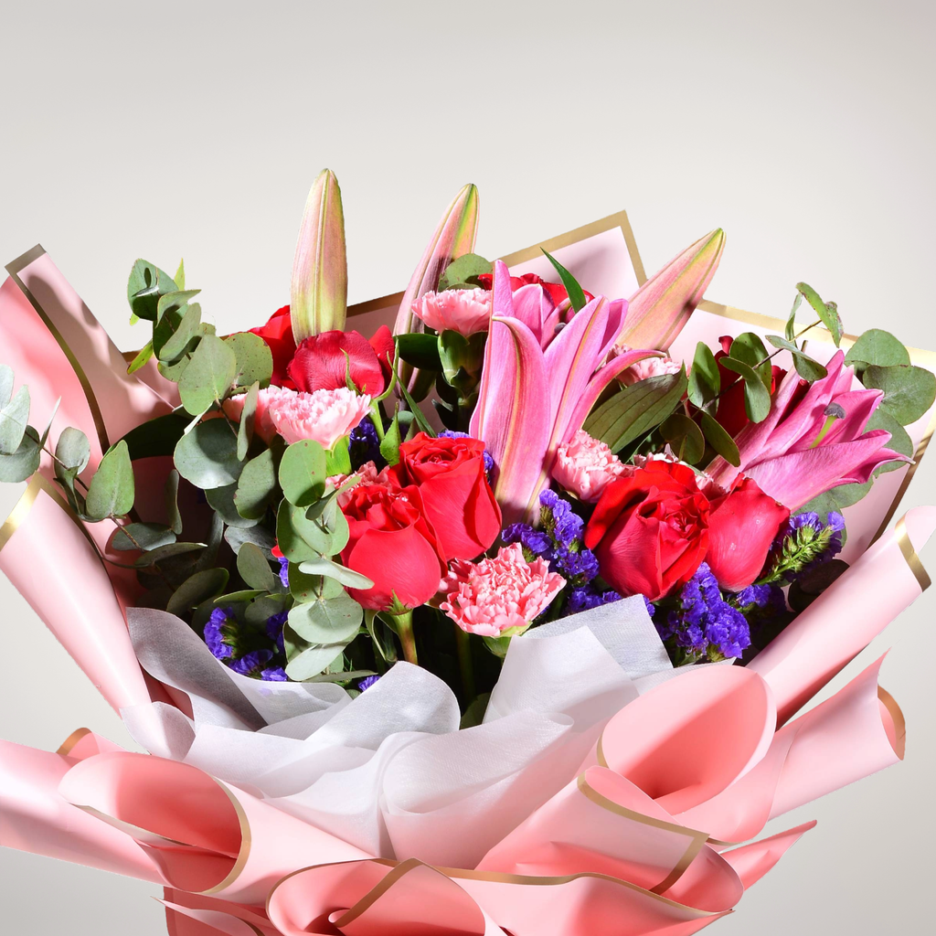 Moonlight Whisper lilies, carnation and rose hand bouquet for birthday or anniversary with delivery in Kuala Lumpur and Selangor