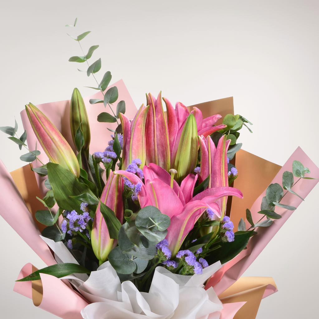Secret Garden lilies and statice hand bouquet for birthday or anniversary with delivery in Kuala Lumpur and Selangor
