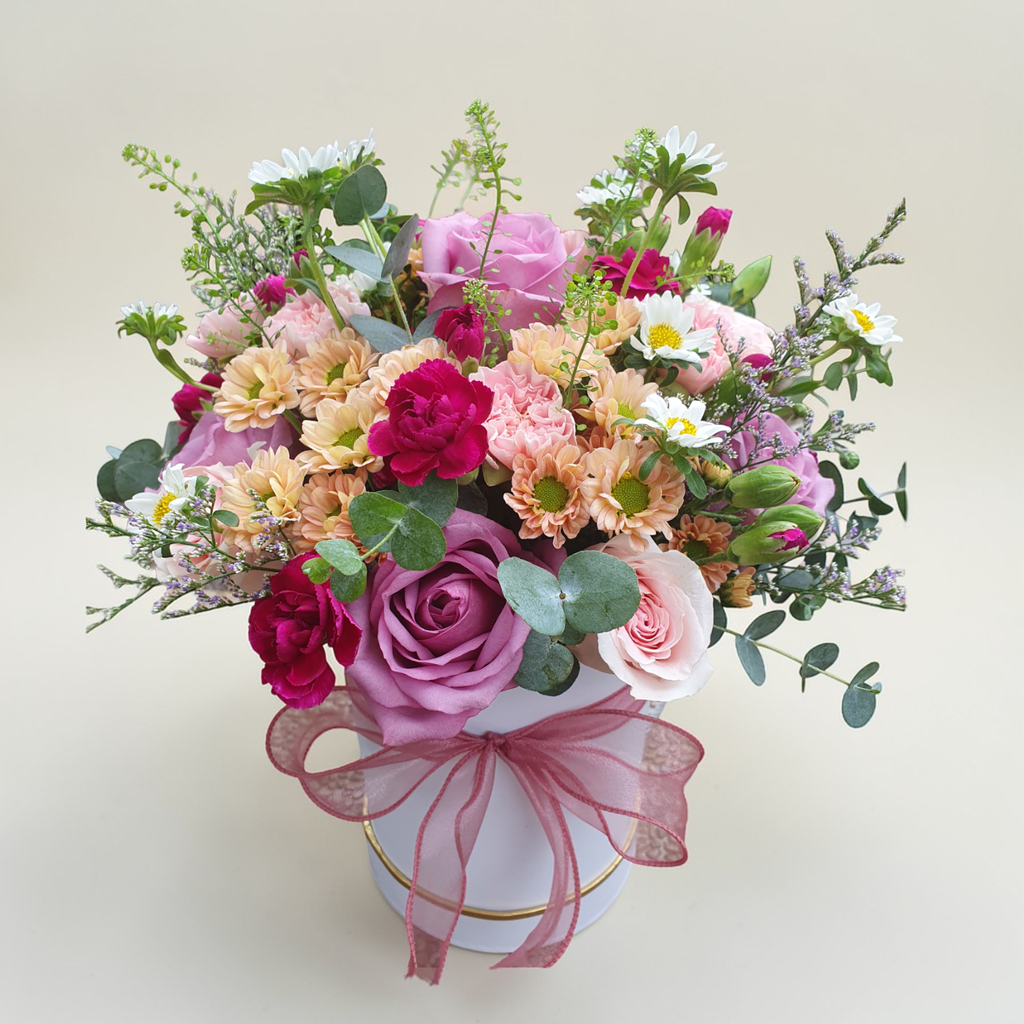 Bloom Haven rose and carnation table arrangement for birthday or anniversary with delivery in Kuala Lumpur and Selangor