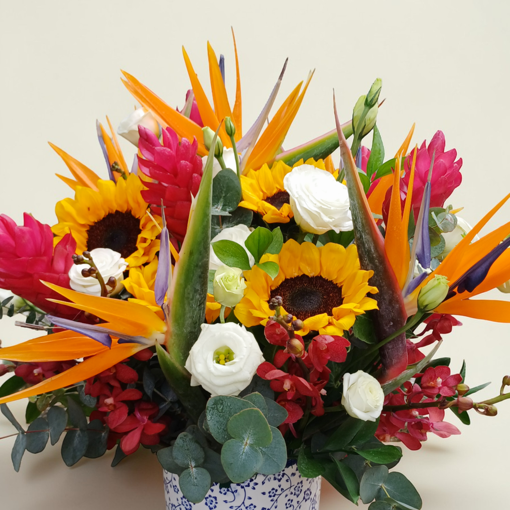Elegant Meadow sunflower and bird of paradise table arrangement for birthday or anniversary with delivery in Kuala Lumpur and Selangor
