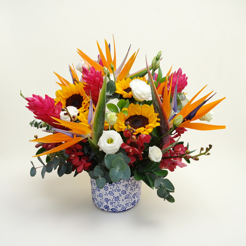 Elegant Meadow sunflower and bird of paradise table arrangement for birthday or anniversary with delivery in Kuala Lumpur and Selangor
