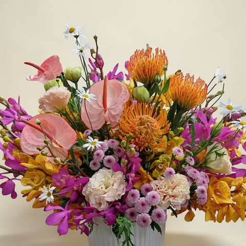 Tranquil Petals pin cushion protea and orchid table arrangement for birthday or anniversary with delivery in Kuala Lumpur and Selangor