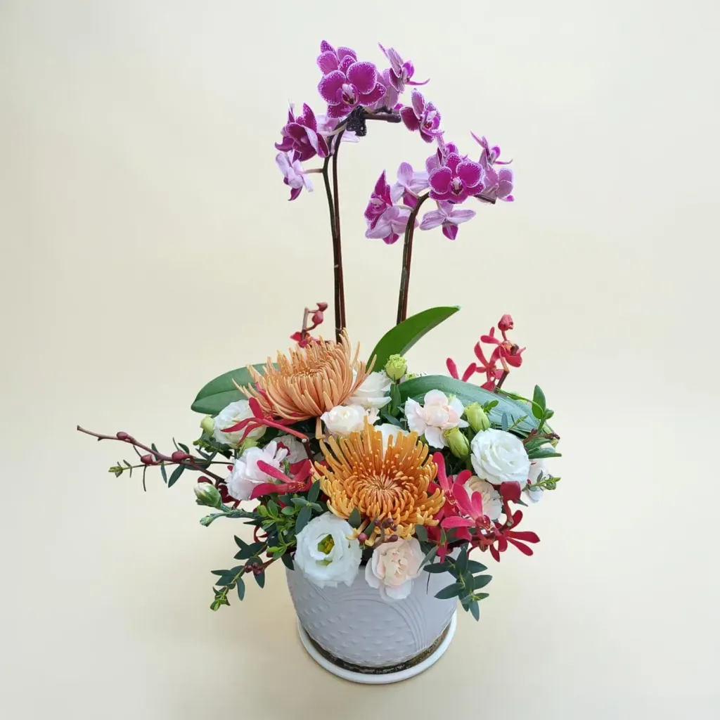 Floral Charm phalaenopsis orchid, chrysanthemum and eustoma table arrangement for birthday or anniversary with delivery in Kuala Lumpur and Selangor
