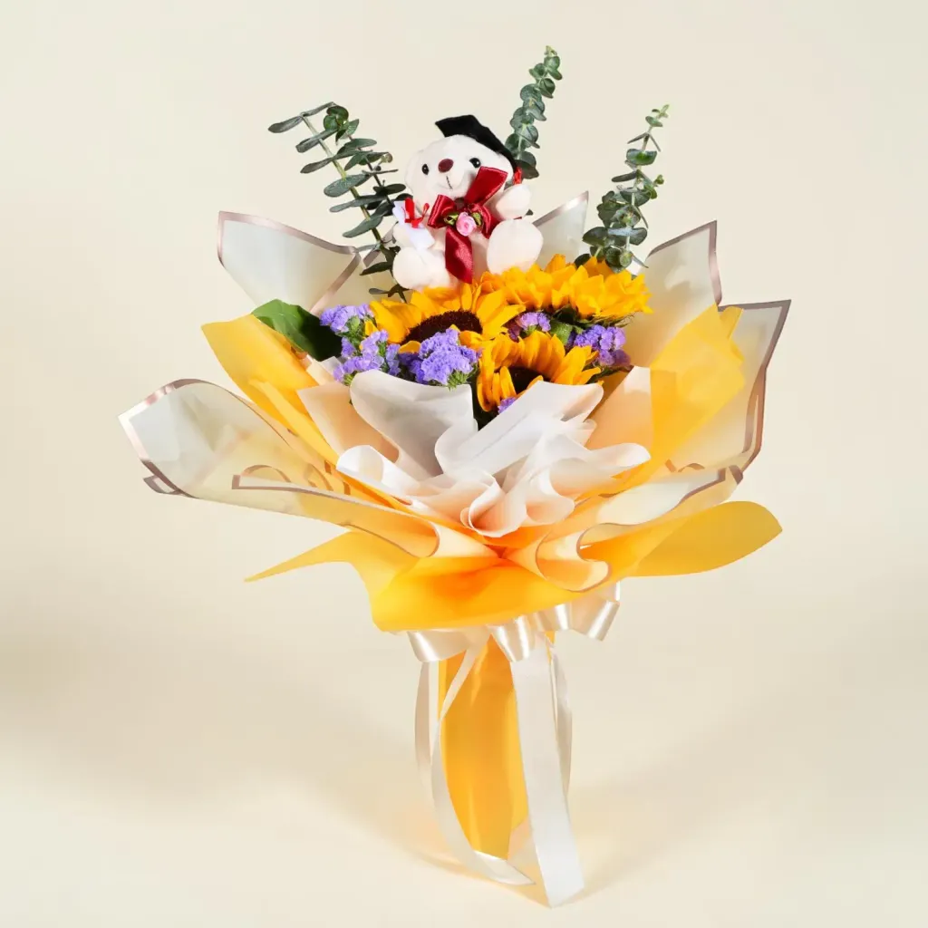 Next Chapter sunflower, gerberas and bear hand bouquet for university graduation with delivery in Kuala Lumpur and Selangor