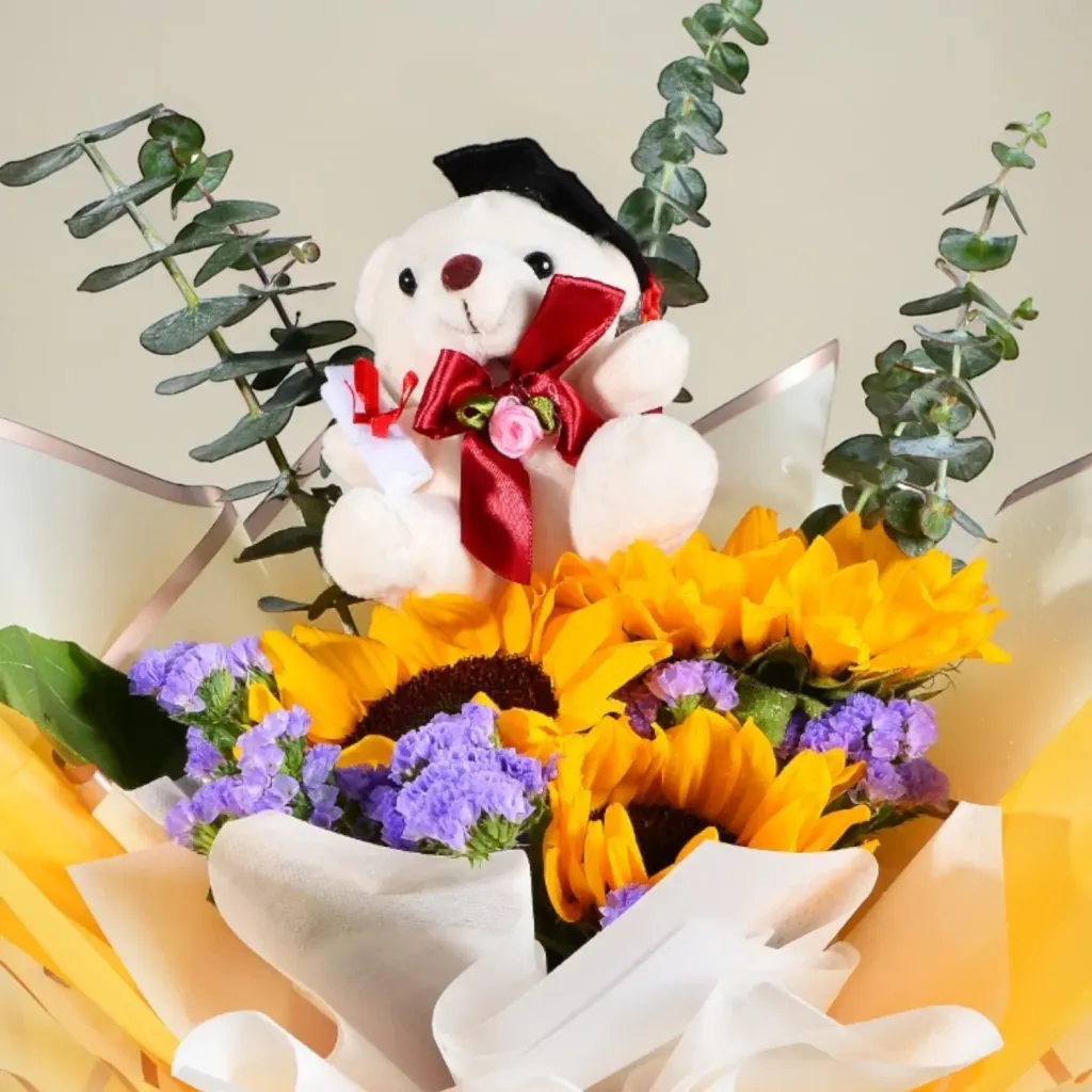 Next Chapter sunflower, gerberas and bear hand bouquet for university graduation with delivery in Kuala Lumpur and Selangor
