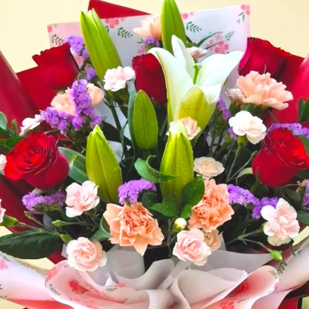 Petal Whisper lilies, roses and carnations hand bouquet for Mother's Day or birthday with delivery in Kuala Lumpur and Selangor