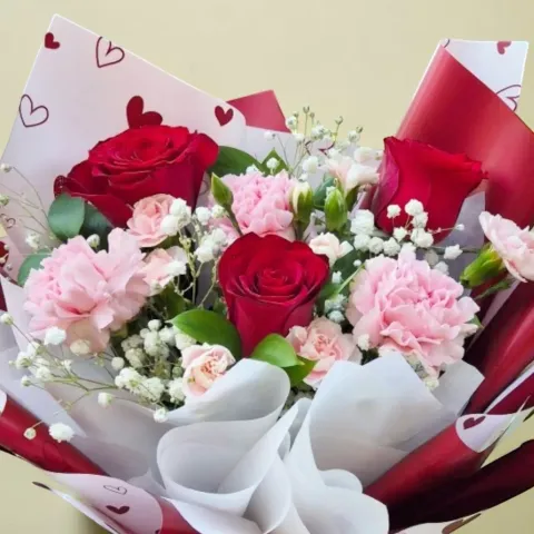 Radiant Blossom roses and carnations hand bouquet for Mother's Day or birthday with delivery in Kuala Lumpur and Selangor