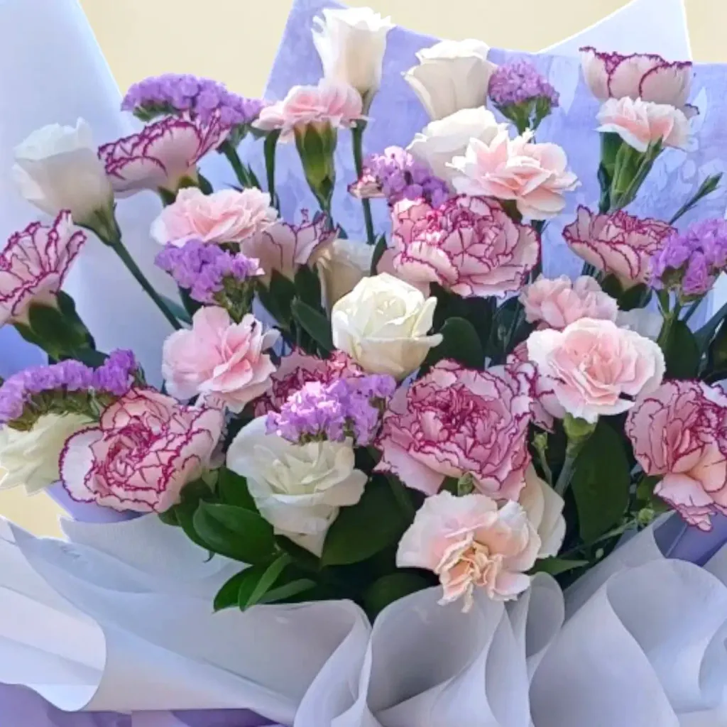 Blooming Fantasy carnations, eustomas and spray carnations hand bouquet for Mother's Day or birthday with delivery in Kuala Lumpur and Selangor