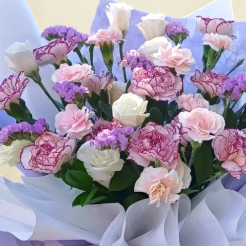 Blooming Fantasy carnations, eustomas and spray carnations hand bouquet for Mother's Day or birthday with delivery in Kuala Lumpur and Selangor