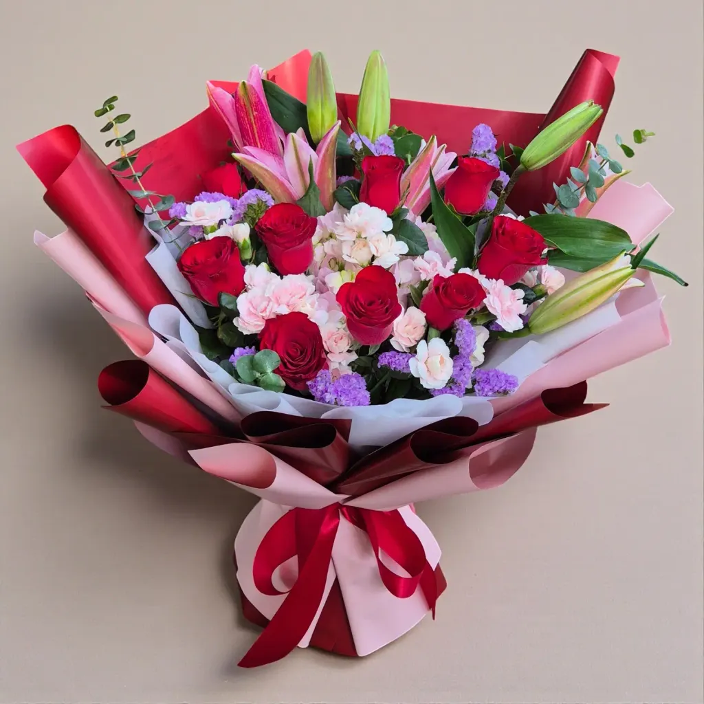 Gentle Bloom lilies, roses and hydrangea hand bouquet for birthday with delivery in Kuala Lumpur and Selangor