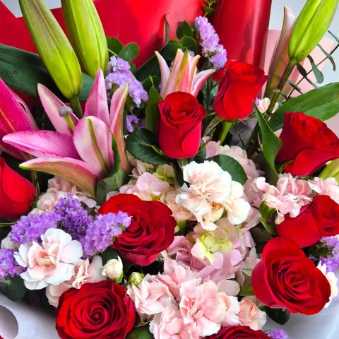 Gentle Bloom lilies, roses and hydrangea hand bouquet for birthday with delivery in Kuala Lumpur and Selangor