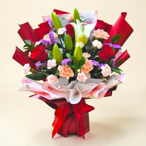 Petal Whisper lilies, roses and carnations hand bouquet for Mother's Day or birthday with delivery in Kuala Lumpur and Selangor