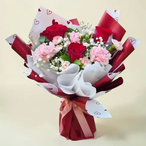 Radiant Blossom roses and carnations hand bouquet for Mother's Day or birthday with delivery in Kuala Lumpur and Selangor