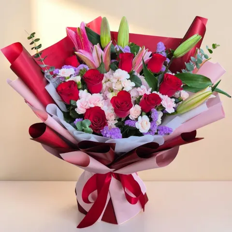 Gentle Bloom lilies, roses and hydrangea hand bouquet for birthday with delivery in Kuala Lumpur and Selangor