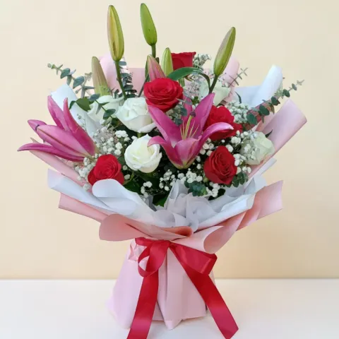 Harmony in Bloom lilies and rose hand bouquet for birthday or anniversary with delivery in Kuala Lumpur and Selangor