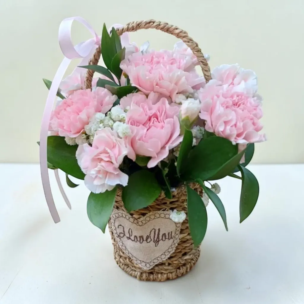 Petal Glow carnations and spray carnations table arrangement for Mother's Day or birthday with delivery in Kuala Lumpur and Selangor