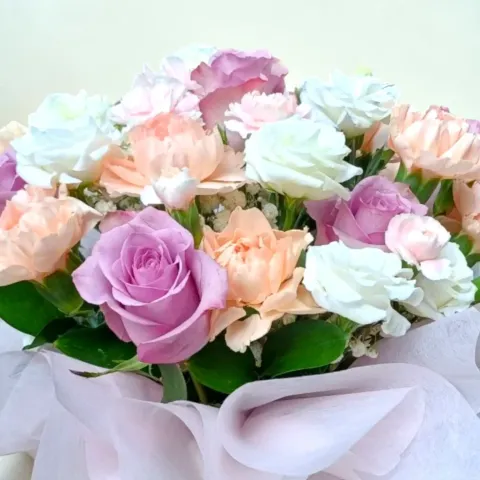 Delicate Romance roses, carnations, eustomas and spray carnations table arrangement for Mother's Day or birthday with delivery in Kuala Lumpur and Selangor