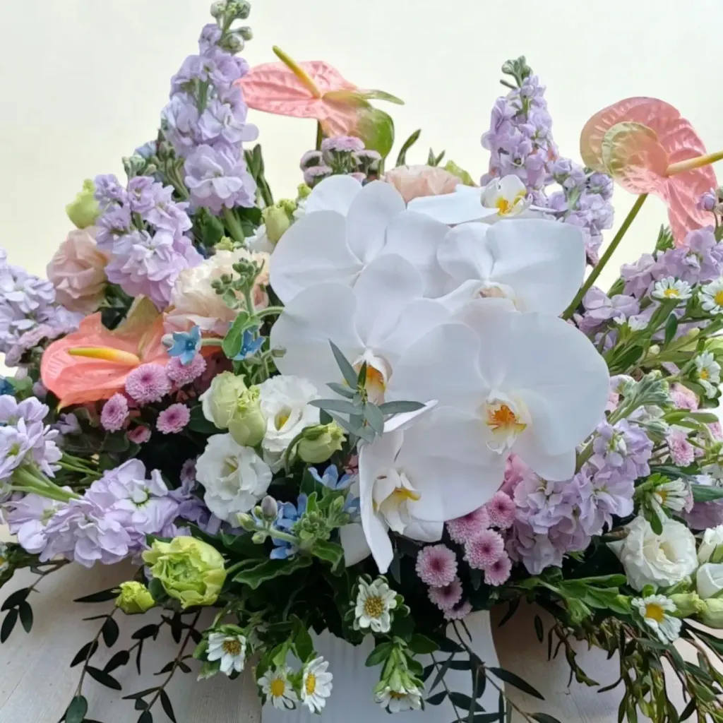 Petal Reflections phalaenopsis orchid, hydreangea, matthiola and eustoma table arrangement for birthday or anniversary with delivery in Kuala Lumpur and Selangor