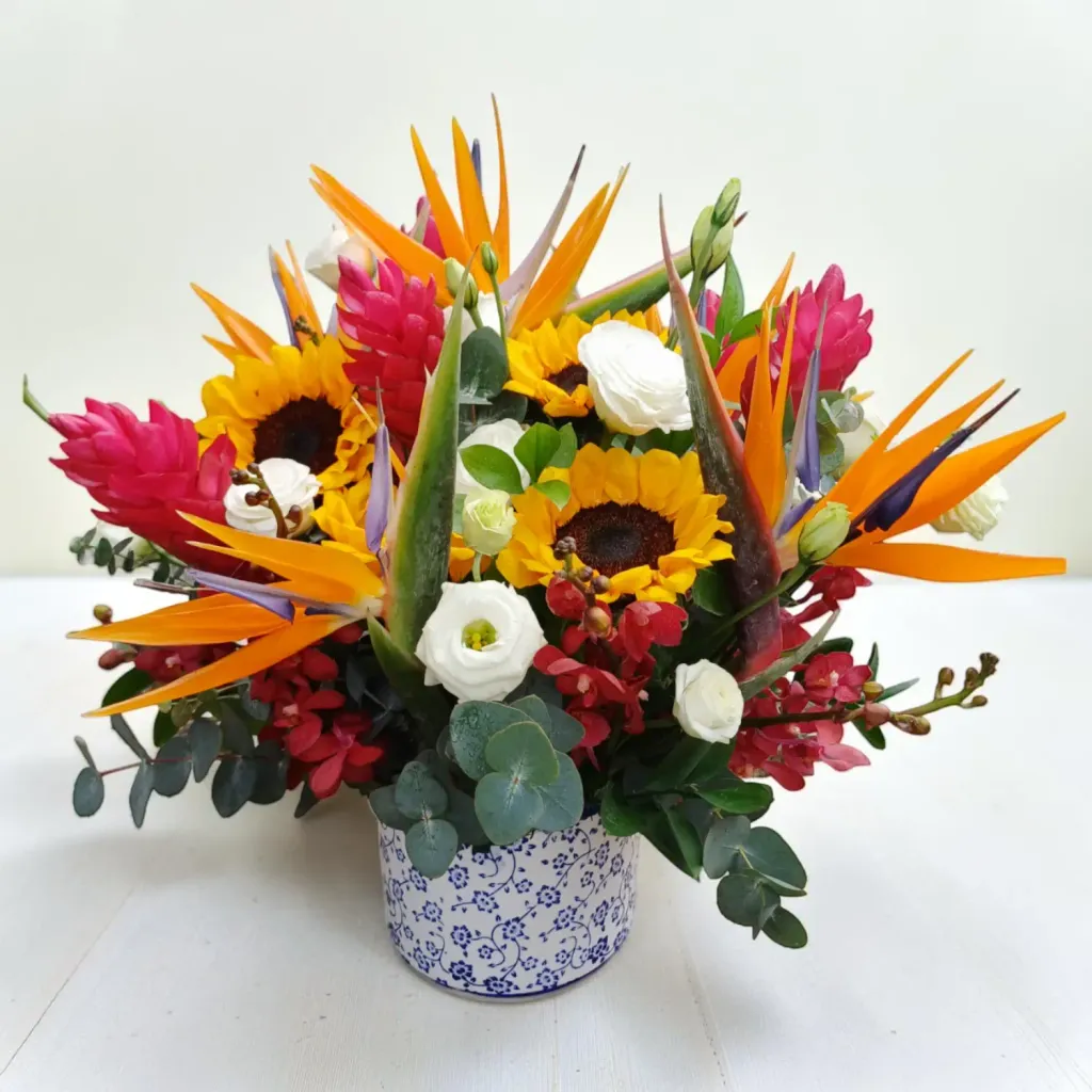 Elegant Meadow sunflower and bird of paradise table arrangement for birthday or anniversary with delivery in Kuala Lumpur and Selangor