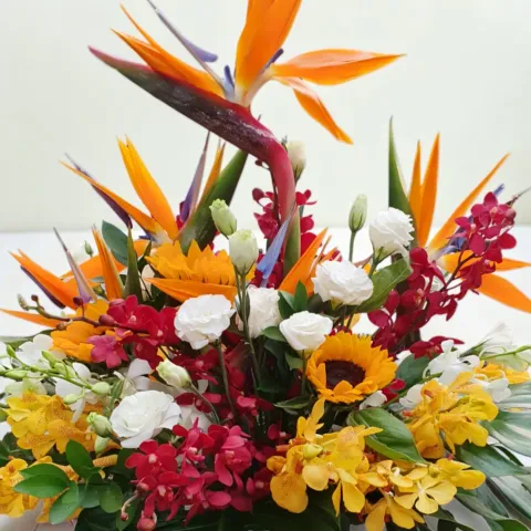 Serene Blossoms bird of paradise, sunflower and orchid table arrangement for birthday or anniversary with delivery in Kuala Lumpur and Selangorise-sunflower-orchid-table-arrangement-birthday-anniversary-delivery-kl-selangor-near