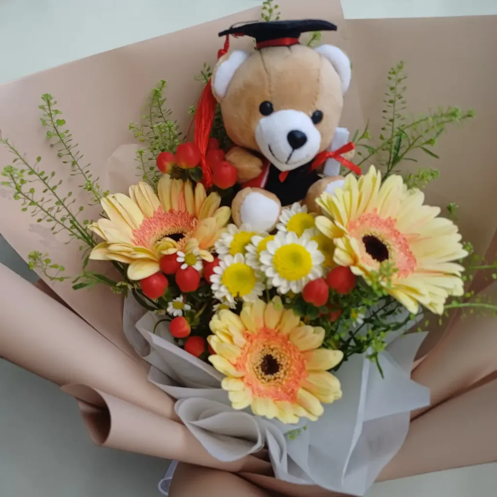 Bloom & Grace gerberas, pom pom, berries and graduation bear flower bouquet for graduation with delivery across KL & Selangor