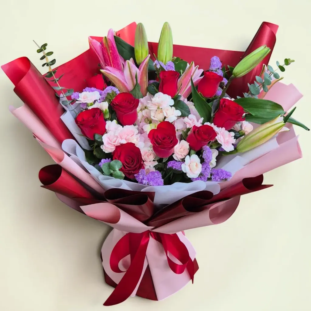 Gentle Bloom lilies, roses and hydrangea hand bouquet for birthday with delivery in Kuala Lumpur and Selangor