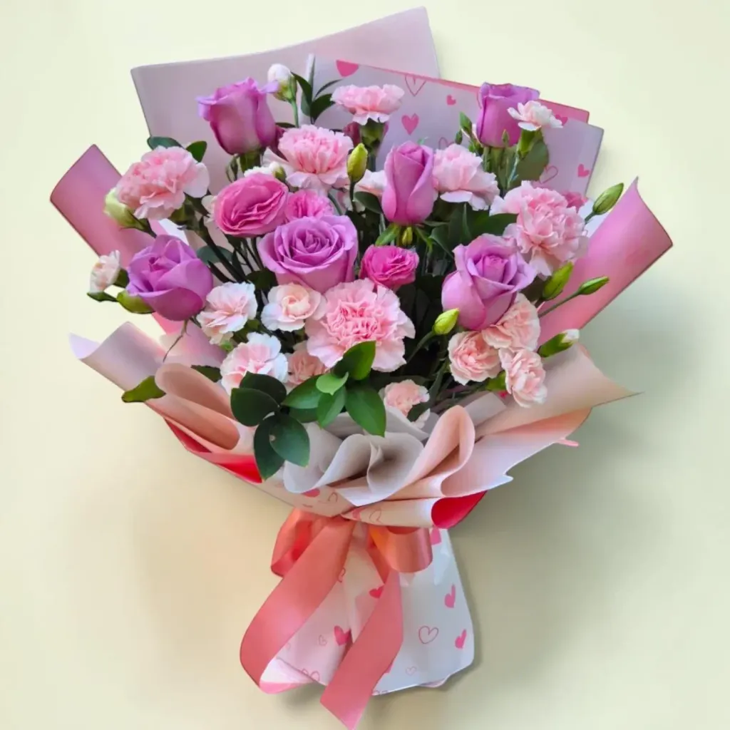 Petal Elegance eustomas, roses and carnations hand bouquet for Mother's Day or birthday with delivery in Kuala Lumpur and Selangor