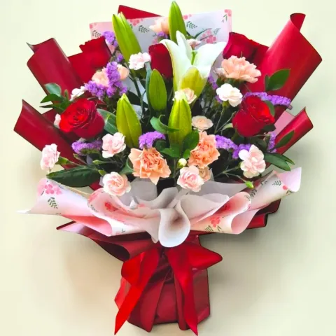 Petal Whisper lilies, roses and carnations hand bouquet for Mother's Day or birthday with delivery in Kuala Lumpur and Selangor