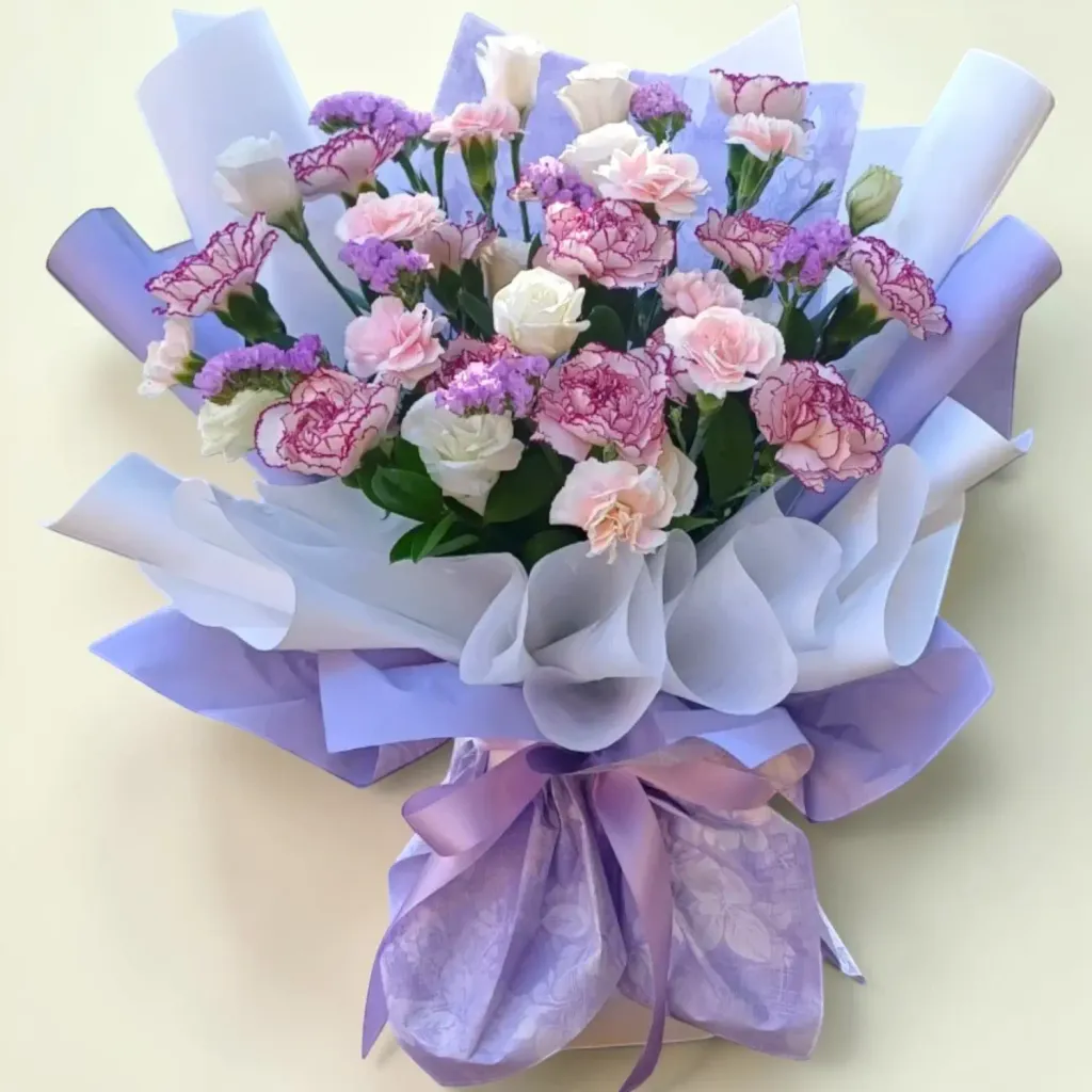 Blooming Fantasy carnations, eustomas and spray carnations hand bouquet for Mother's Day or birthday with delivery in Kuala Lumpur and Selangor