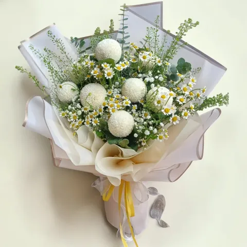 Blooming Elegance ping pong and camomile hand bouquet for birthday or anniversary with delivery in Kuala Lumpur and Selangor