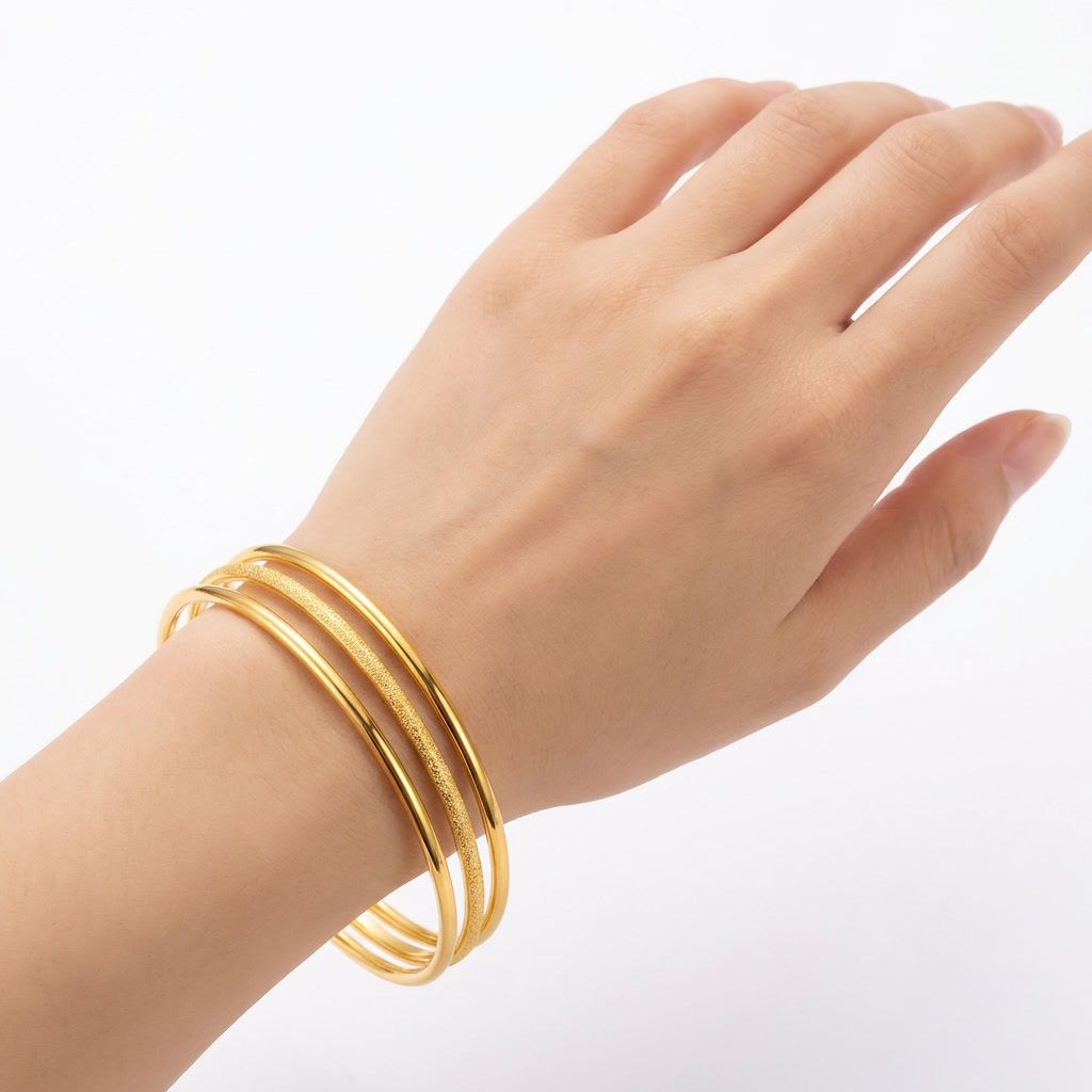 gemini-image-2_First_Photo_with_model_hand_wearing_the_bangles_Prompt_Close-up_shot_of_three_go-0