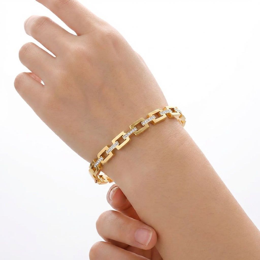 gemini-image-2_First_Photo_worn_on_model_s_hand_Prompt_Close-up_shot_of_a_gold_chain_bracelet_w-0 (1)