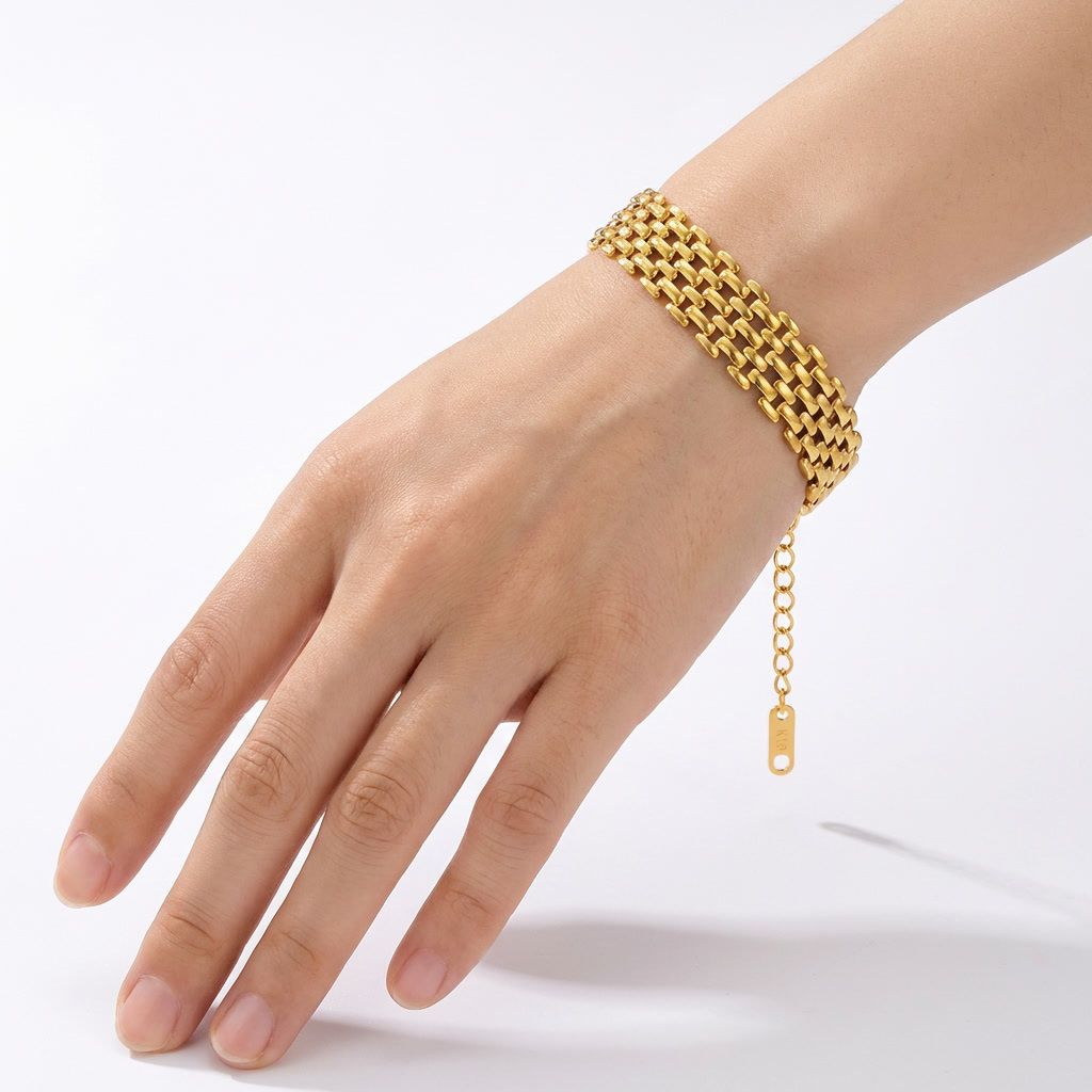 gemini-image-2_Model_hand_shot_Prompt_Generate_a_high-quality_image_of_the_gold_bracelet_worn_o-0