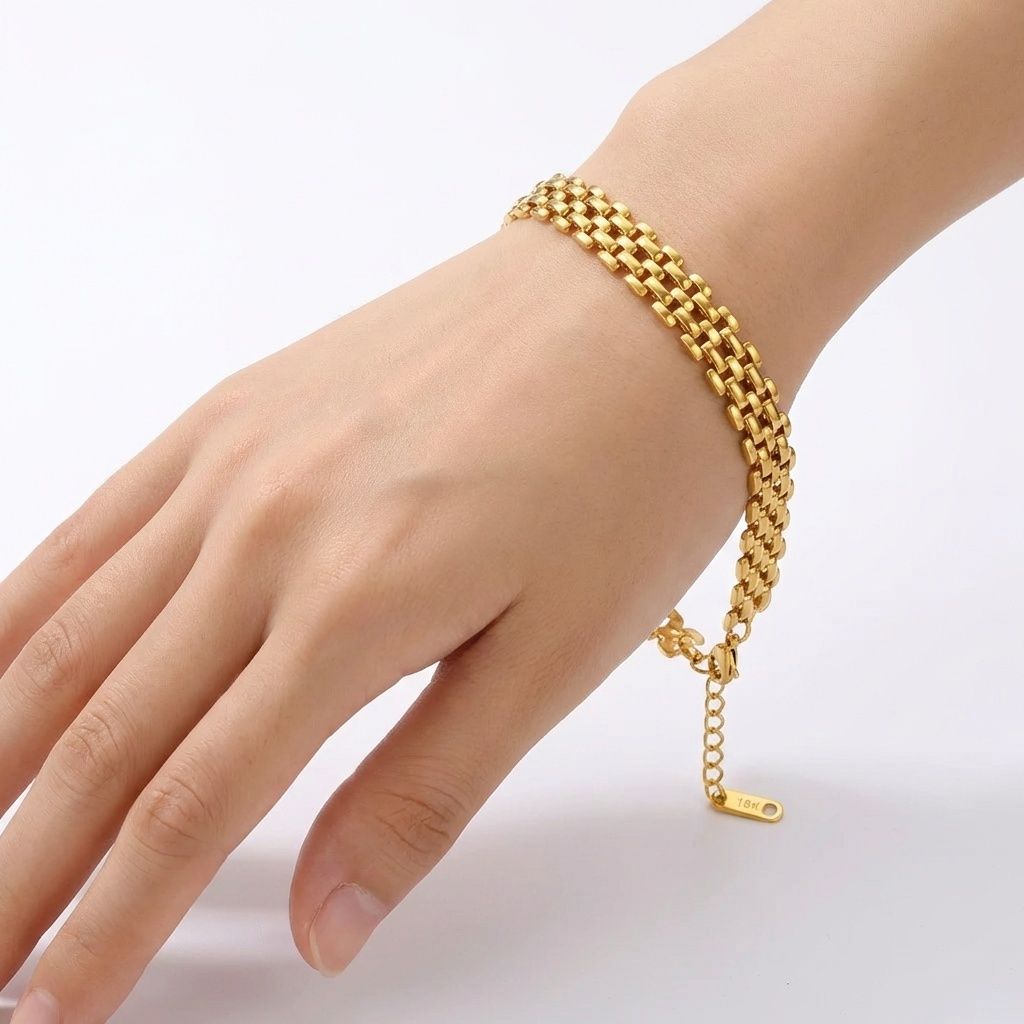 gemini-image-2_Model_hand_shot_Prompt_Generate_a_high-quality_image_of_the_gold_bracelet_worn_o-0 (1)