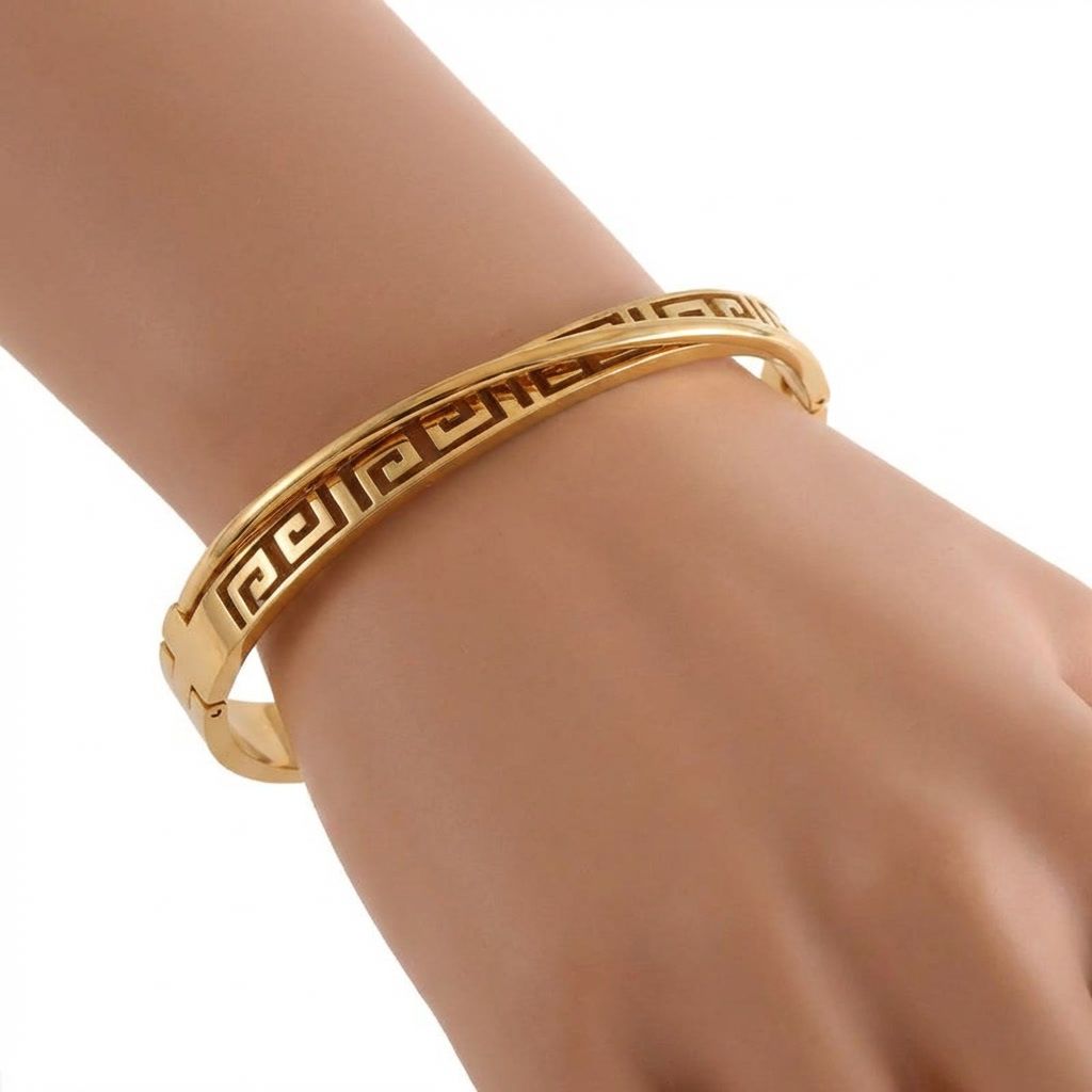 gemini-image-2_Model_hand_shot_Prompt_Create_a_high-quality_image_of_the_gold_bangle_bracelet_w-0