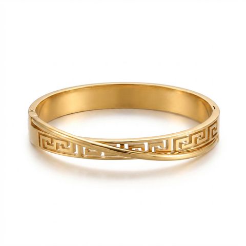 gemini-image-2_Front_angle_shot_Prompt_Create_a_high-quality_product_image_of_a_gold_bangle_bra-0
