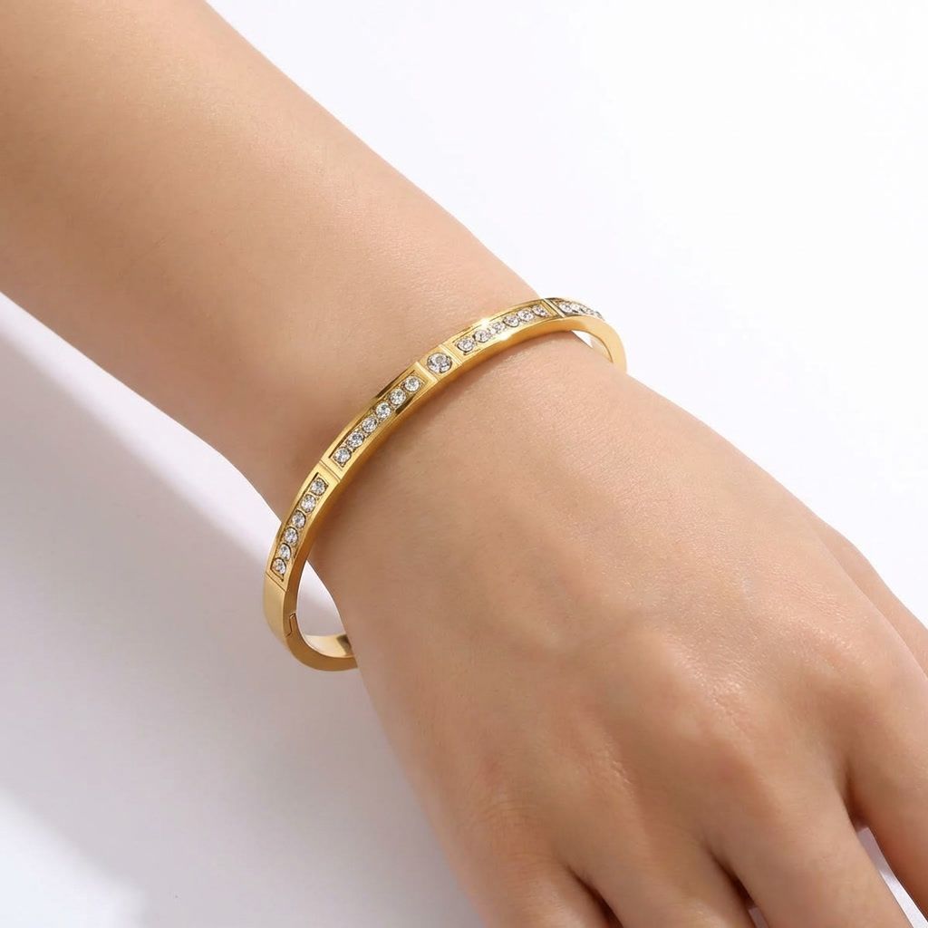 gemini-image-2_Model_hand_shot_Prompt_Create_a_high-quality_image_of_the_gold_bangle_bracelet_w-0 (1)