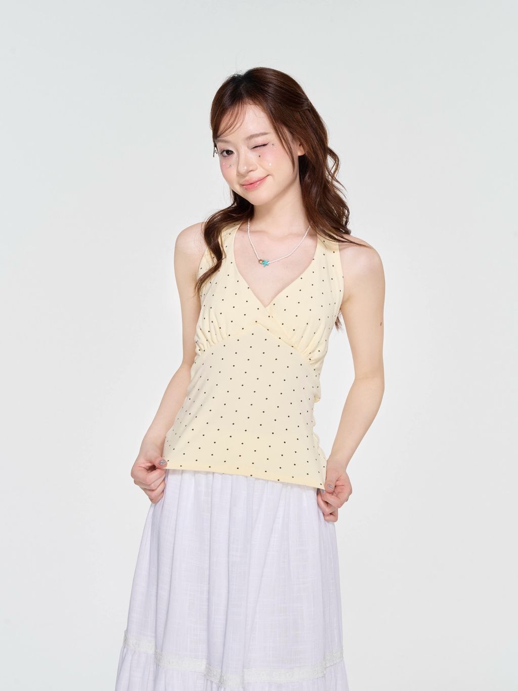 Jena-Top-Ao-thun-co-yem-cham-bi-co-buoc-no