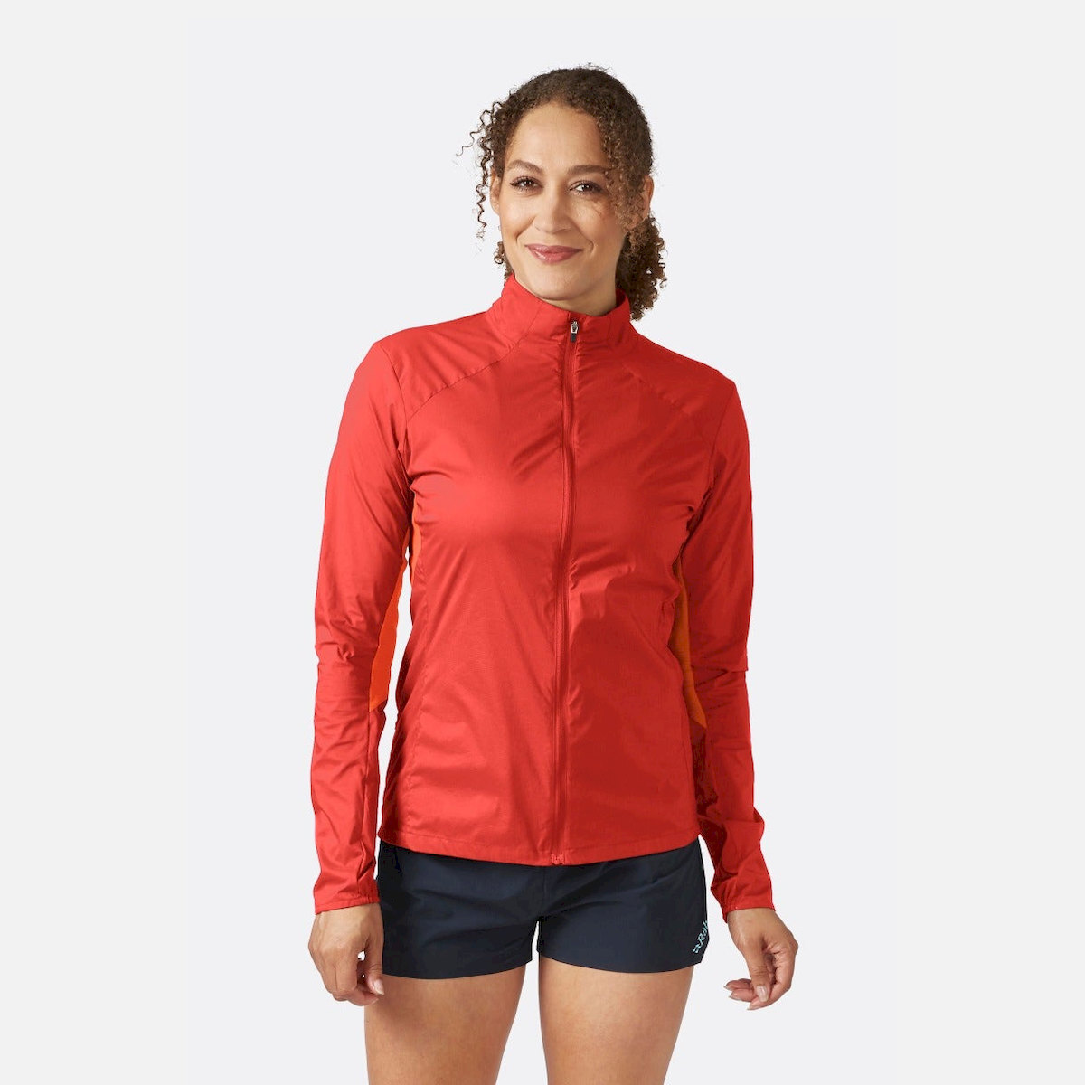 womens_windveil_jacket_tuscanred_redgrapefruit_qws_69_tgp_model_2_cover