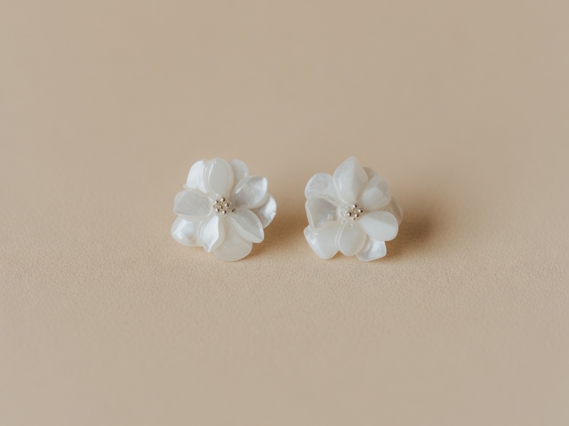 Bloom Earrings seen straight on, ivory and cream petals