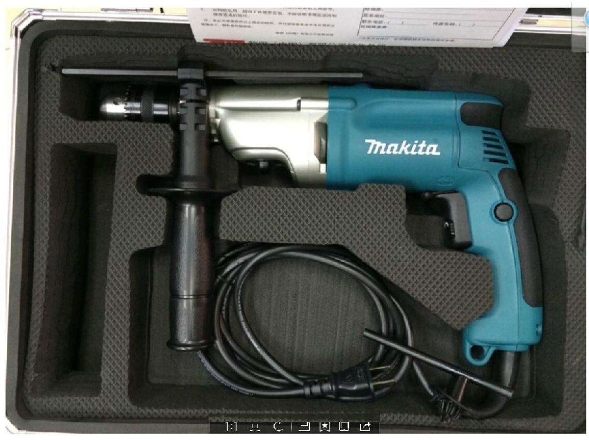 Makita 720W 20mm 2Speed Hammer Drill with 70pc Accessories MY Power